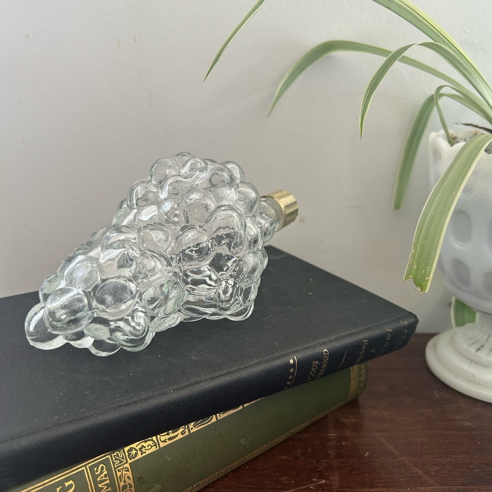 vintage clear glass bottle or decanter /cluster of grapes